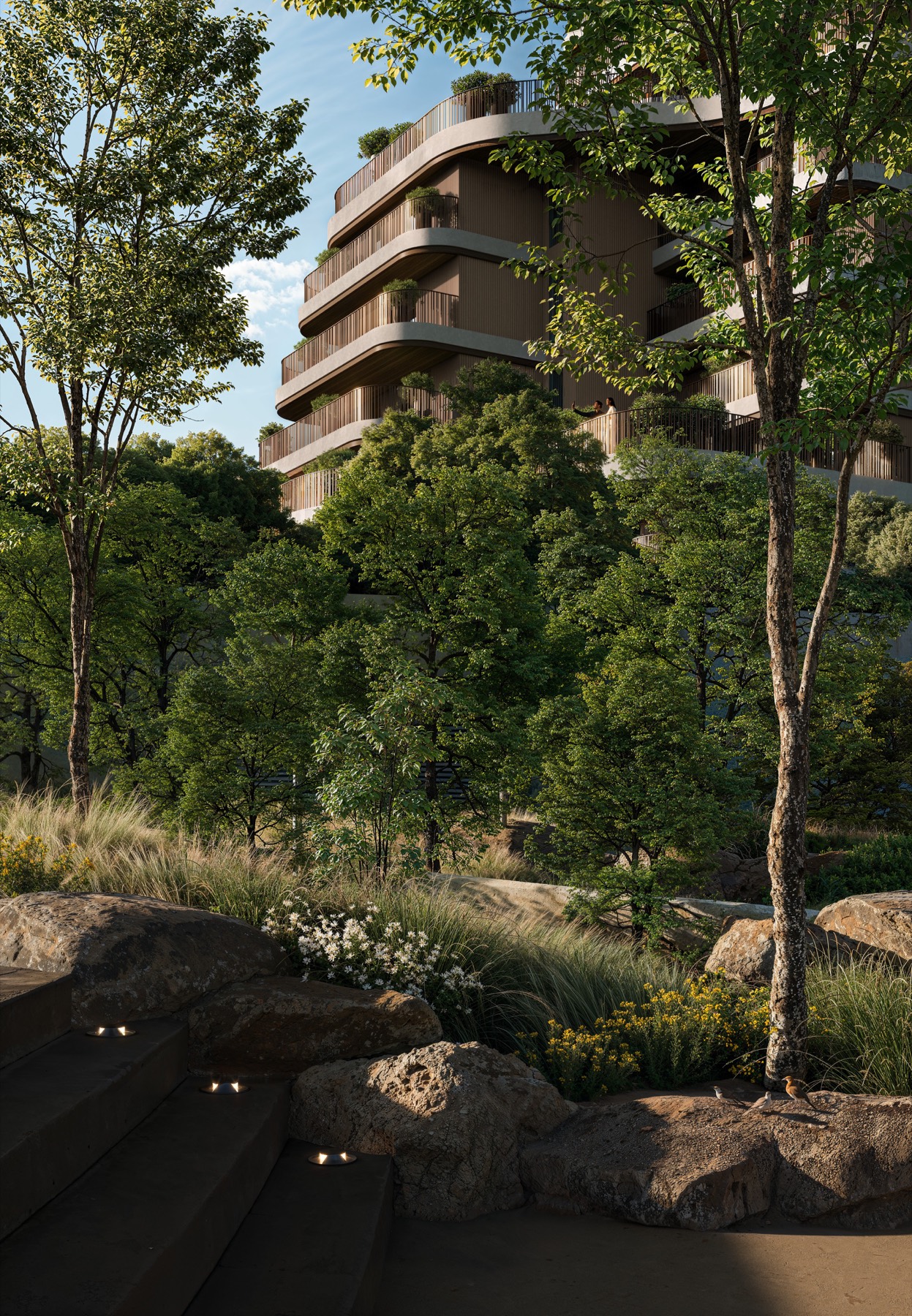The curved residential buildings rising out of dense trees at The Wilds Residences.